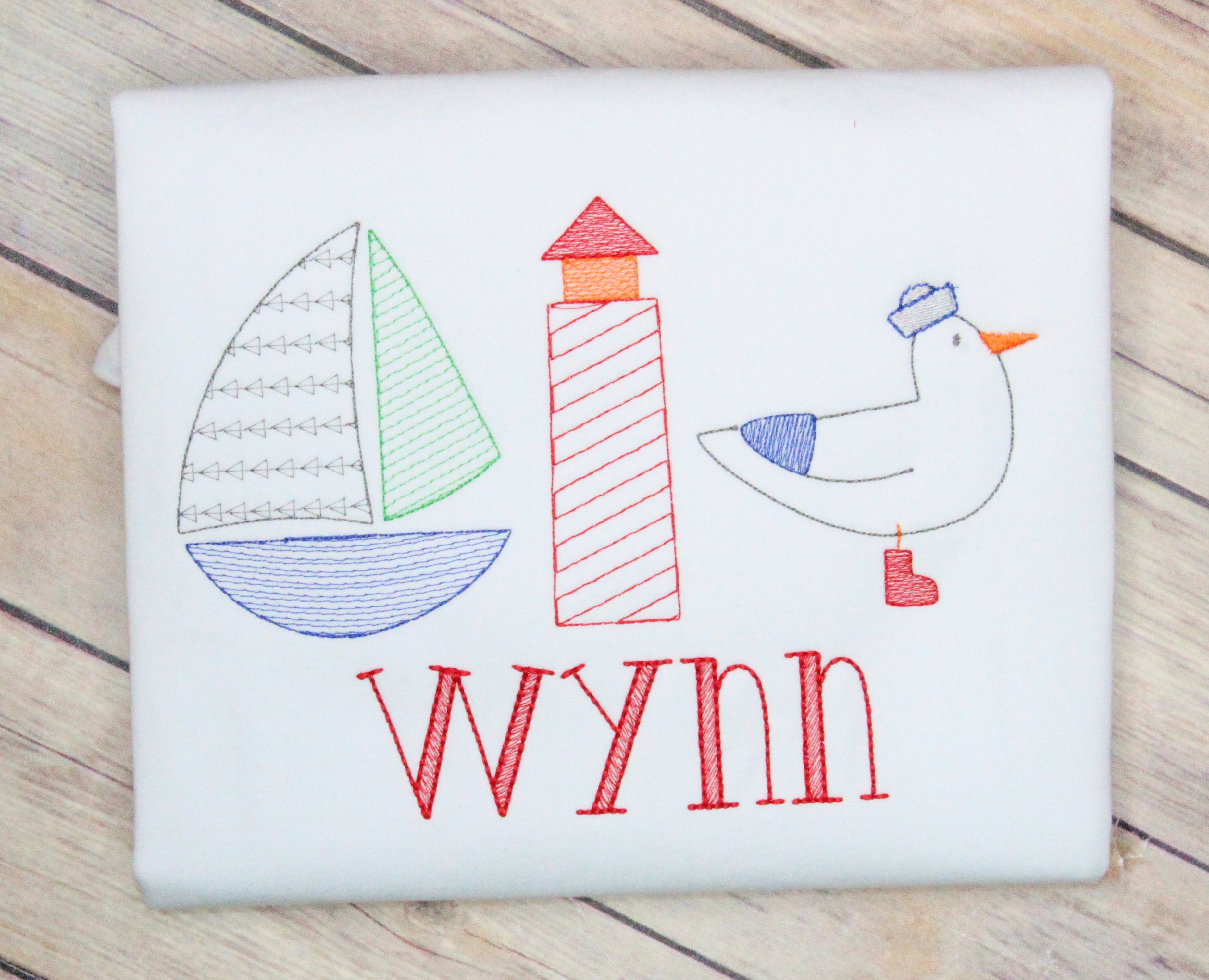 Sailboat and Pelican Summer Embroidery Design